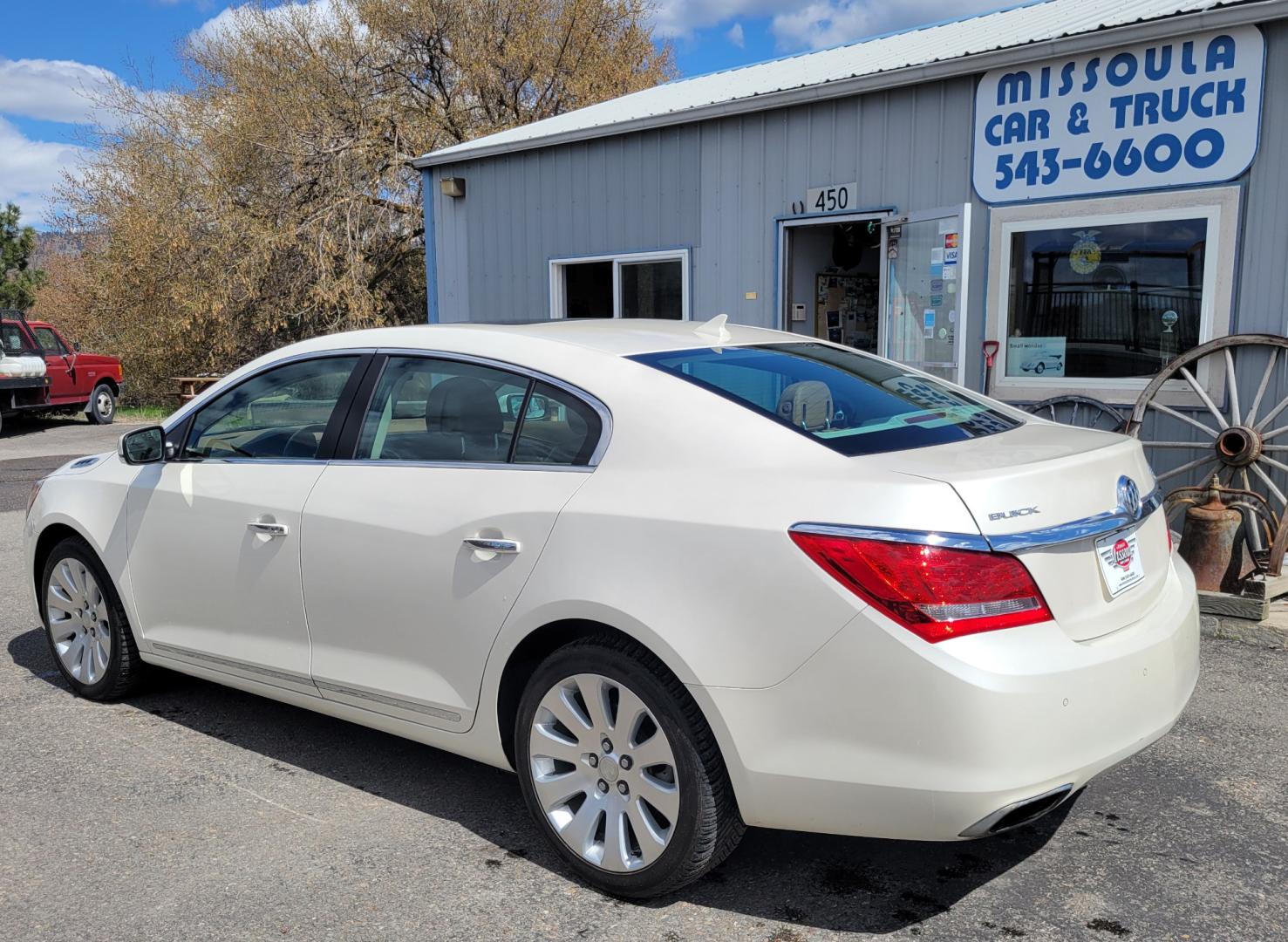 2014 Pearl White /Brown Buick LaCrosse PREMIUM (1G4GE5G33EF) with an 3.6L V6 engine, 6 Speed Auto transmission, located at 450 N Russell, Missoula, MT, 59801, (406) 543-6600, 46.874496, -114.017433 - Beautiful AWD Luxury Sedan. 3.6L V6 Engine. 6 Speed Automatic Transmission. Power Sunroof. Leather Heated Seats. Bluetooth. Memory Seats. Air. Cruise. Tilt. Power Windows and Locks. AM FM XM CD. Bose Sound. Remote Start. Adaptive Cruise Control. - Photo#5